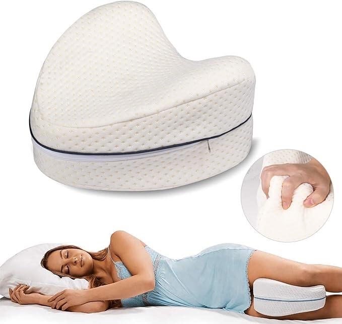 Almohada ortopédica para la columna vertebral | Bigstock